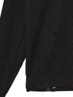 Żakardowy sweter ze strzępieniami