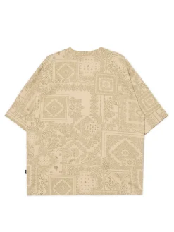 Beżowa koszulka z nadrukiem all over