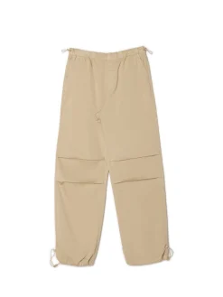 Beżowe jeansy parachute