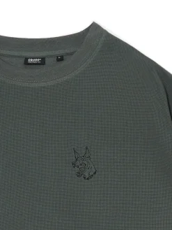 Ciemnozielona koszulka z naszywką