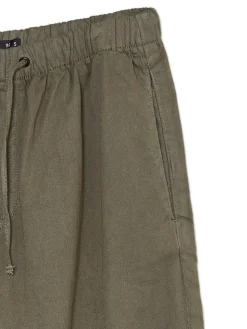 Ciemnozielone jeansy parachute