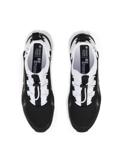 Czarno-białe sneakersy z odblaskowymi detalami