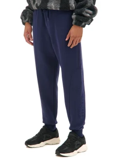 Granatowe dresowe joggery z nadrukiem na nogawce