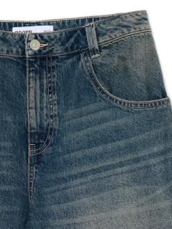 Granatowe jeansy skater z efektem sprania