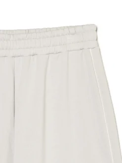 Jasnoszare dresowe joggery z naszywkami