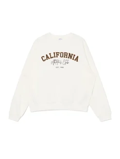 Kremowa bluza z naszywkami