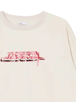 Kremowa bluzka z nadrukiem i regulacją