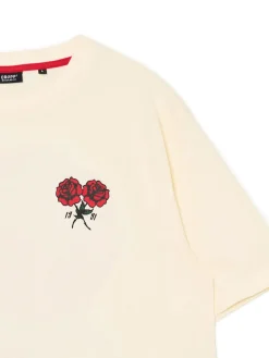 Kremowa koszulka z nadrukiem czerwonych róż
