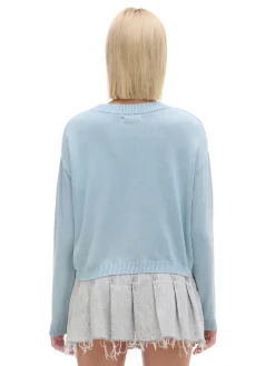 Niebieski sweter z efektem sprania