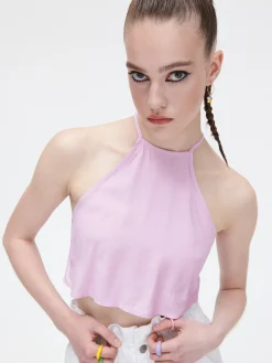 Różowy crop top z ozdobnym wiązaniem