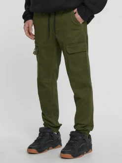 Zielone joggery z kieszeniami cargo